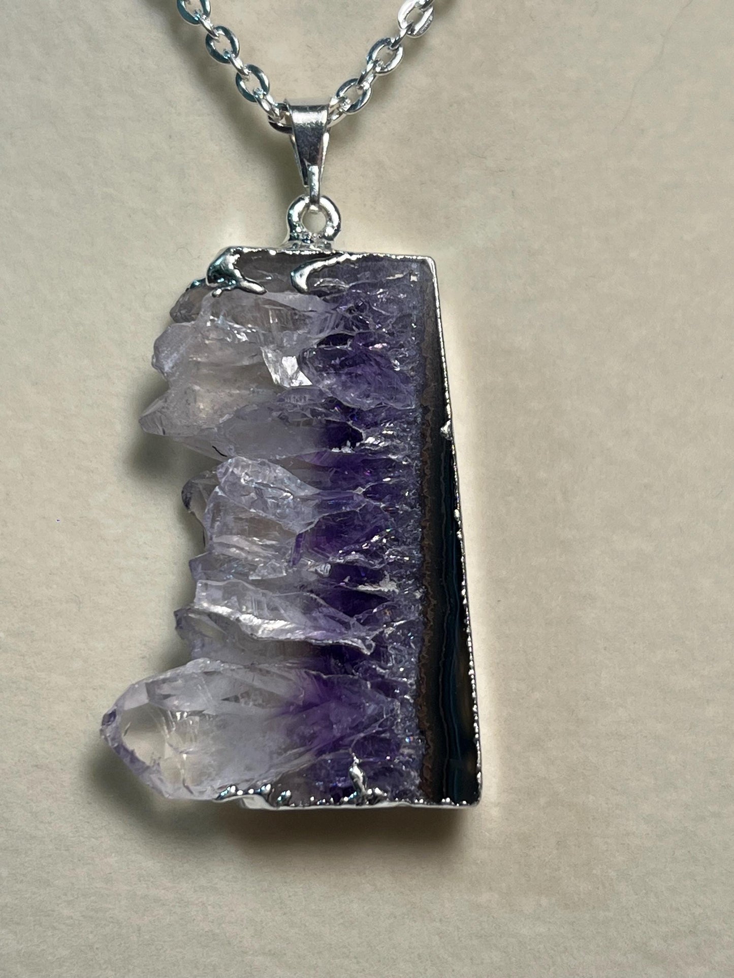 Beautiful Amethyst slice necklace, raw edge crystal pendant from Brazil